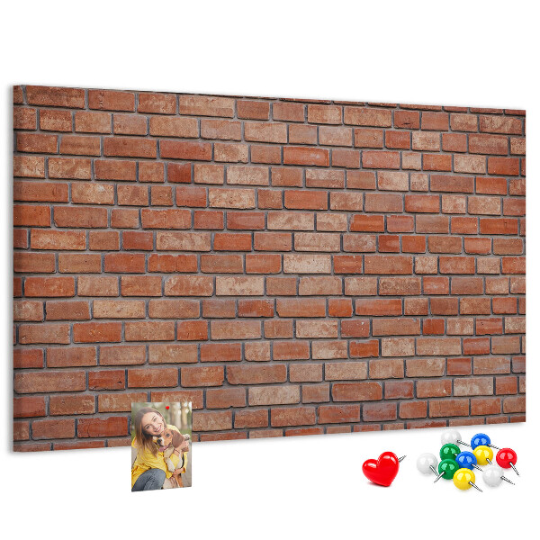 Pizarra de corcho con diseño de pared de ladrillo en tonos cálidos