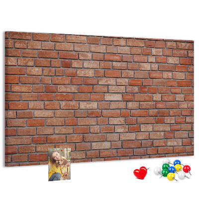 Pizarra de corcho con diseño de pared de ladrillo en tonos cálidos