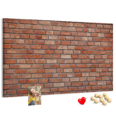 Pizarra de corcho con diseño de pared de ladrillo en tonos cálidos