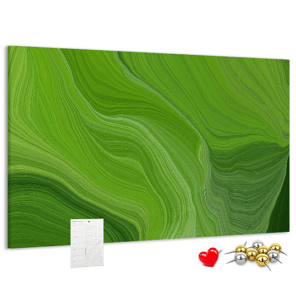 Tablero de corcho decorado con diseño de ondas verdes y líneas delicadas