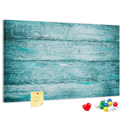 Tablero de corcho decorativo con diseño de tablones de madera en tonos verdes y azules