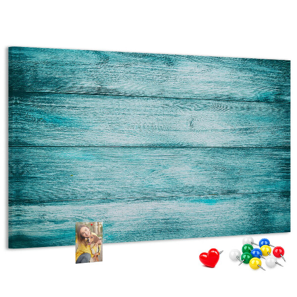 Tablero de corcho decorativo con diseño de tablones de madera en tonos verdes y azules