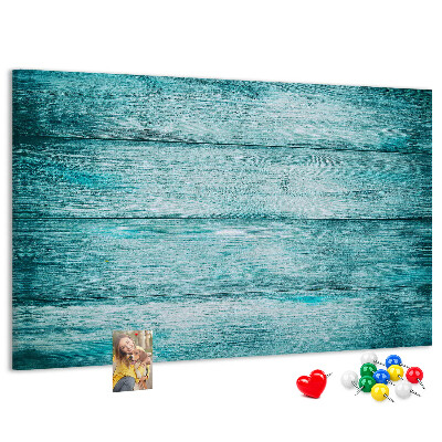 Tablero de corcho decorativo con diseño de tablones de madera en tonos verdes y azules