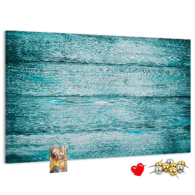 Tablero de corcho decorativo con diseño de tablones de madera en tonos verdes y azules