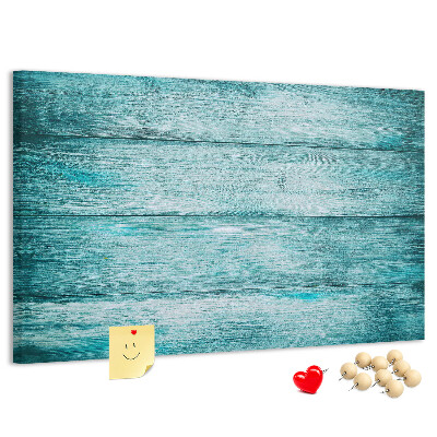 Tablero de corcho decorativo con diseño de tablones de madera en tonos verdes y azules