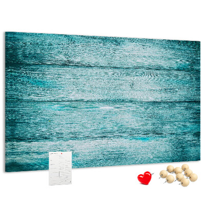 Tablero de corcho decorativo con diseño de tablones de madera en tonos verdes y azules