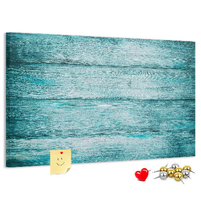 Tablero de corcho decorativo con diseño de tablones de madera en tonos verdes y azules