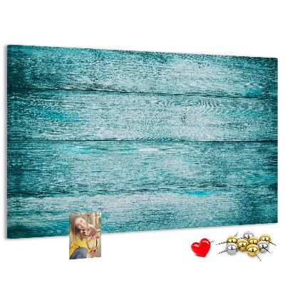 Tablero de corcho decorativo con diseño de tablones de madera en tonos verdes y azules