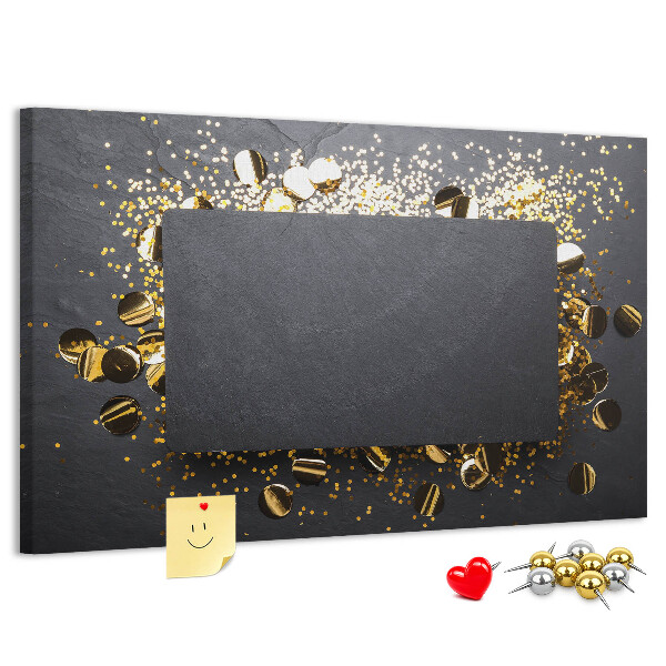 Tablero de anuncios con diseño de confeti dorado sobre fondo negro