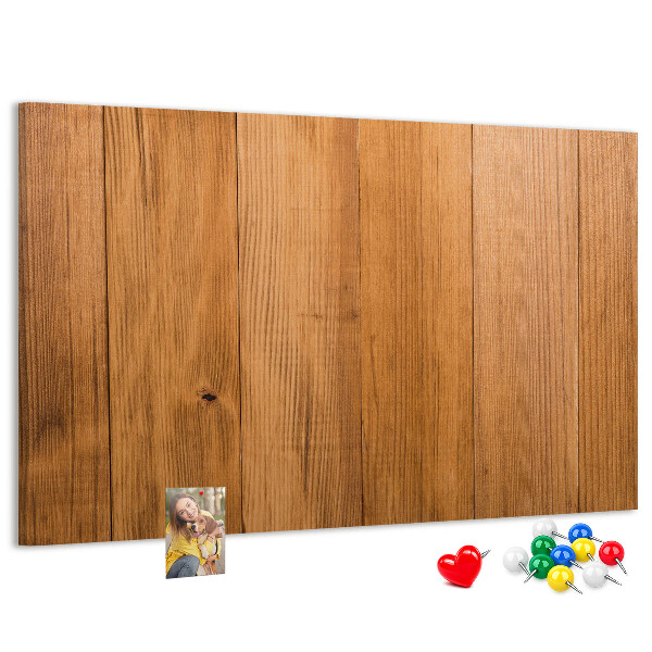 Pizarra de corcho con marco de madera y chinchetas de colores