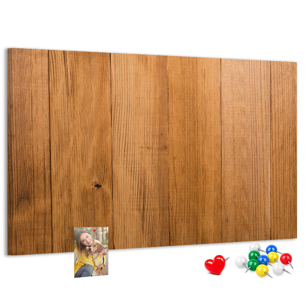 Pizarra de corcho con marco de madera y chinchetas de colores