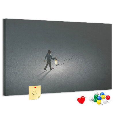 Tablero de anuncios con diseño de una luz de farola en un sendero oscuro