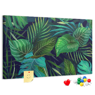 Tablero de corcho decorativo con diseño de hojas tropicales sobre fondo oscuro