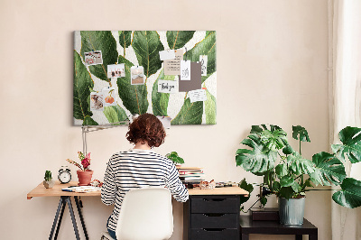 Tablero de anuncios diseño de hojas tropicales en tonos verdes