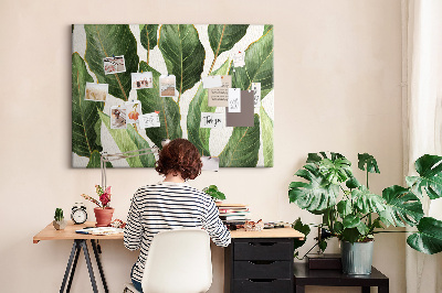 Tablero de anuncios diseño de hojas tropicales en tonos verdes