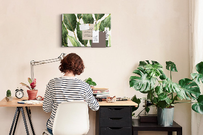 Tablero de anuncios diseño de hojas tropicales en tonos verdes