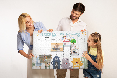 Tablero de corcho decorado planificador semanal con diseño de animales coloridos