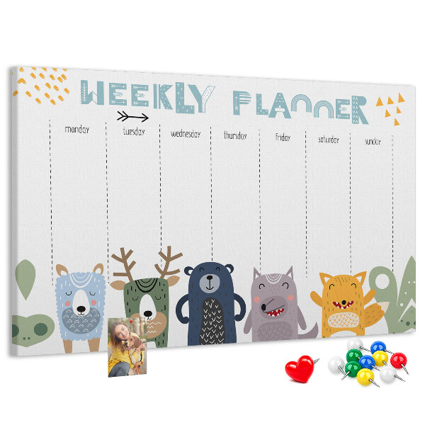 Tablero de corcho decorado planificador semanal con diseño de animales coloridos