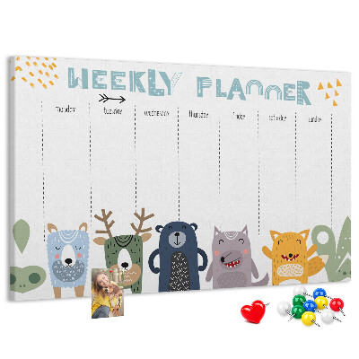 Tablero de corcho decorado planificador semanal con diseño de animales coloridos