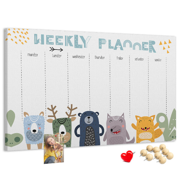 Tablero de corcho decorado planificador semanal con diseño de animales coloridos