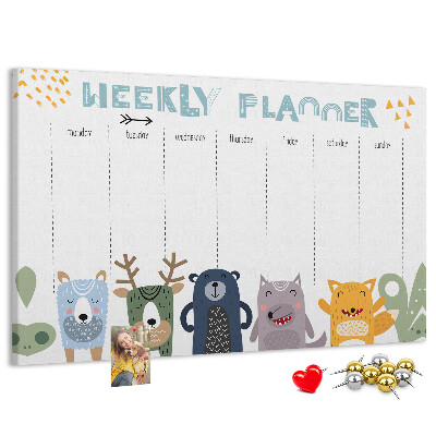 Tablero de corcho decorado planificador semanal con diseño de animales coloridos