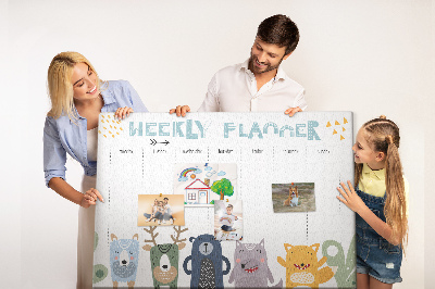 Tablero de corcho decorado planificador semanal con diseño de animales coloridos