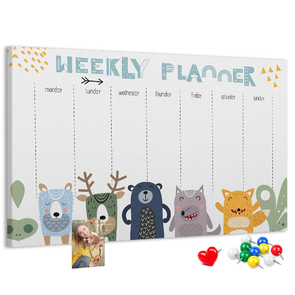 Tablero de corcho decorado planificador semanal con diseño de animales coloridos