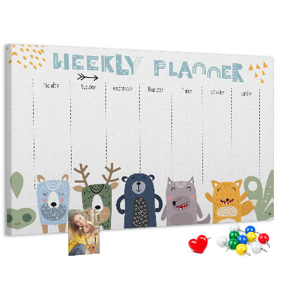 Tablero de corcho decorado planificador semanal con diseño de animales coloridos