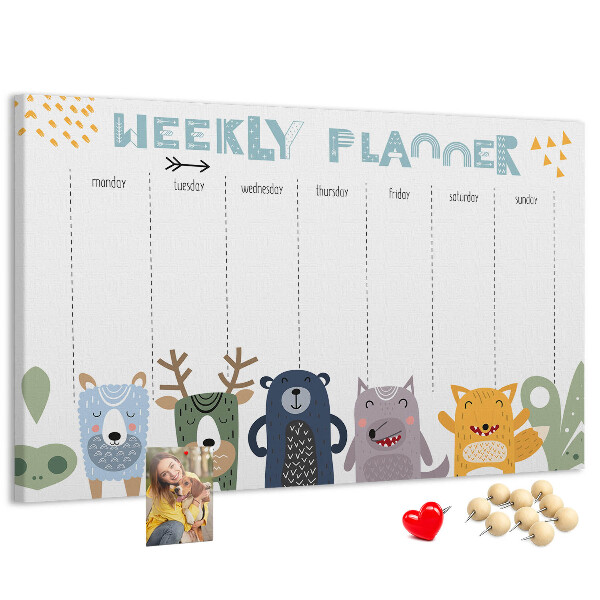 Tablero de corcho decorado planificador semanal con diseño de animales coloridos
