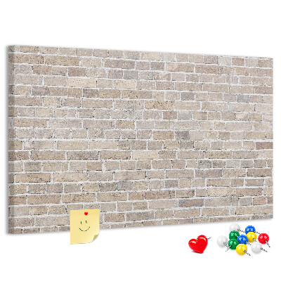 Tablero de corcho decorado Elegante pared de ladrillo en tonos neutros.