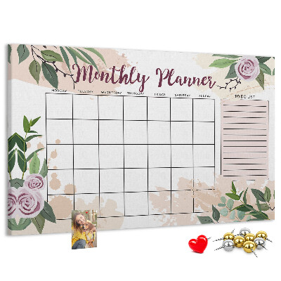 Calendario mensual con detalles florales y tablero de anuncios