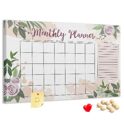 Calendario mensual con detalles florales y tablero de anuncios
