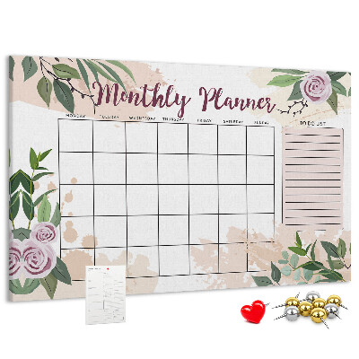 Calendario mensual con detalles florales y tablero de anuncios