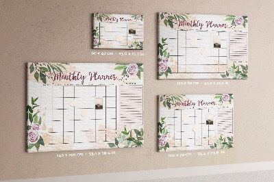 Calendario mensual con detalles florales y tablero de anuncios