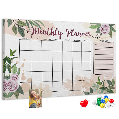 Calendario mensual con detalles florales y tablero de anuncios