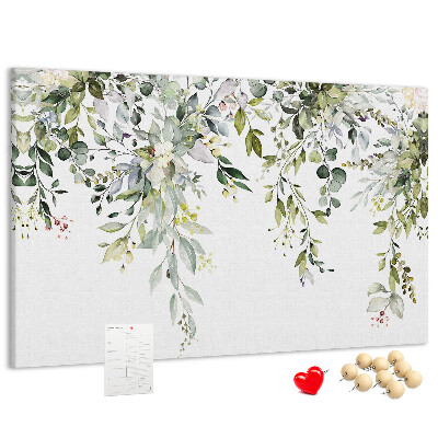 Tablero de anuncios con diseño de hojas verdes y flores delicadas al fondo