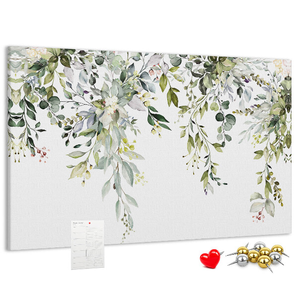 Tablero de anuncios con diseño de hojas verdes y flores delicadas al fondo