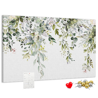 Tablero de anuncios con diseño de hojas verdes y flores delicadas al fondo