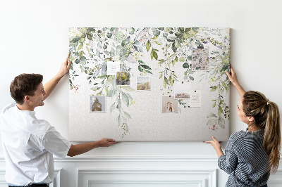 Tablero de anuncios con diseño de hojas verdes y flores delicadas al fondo