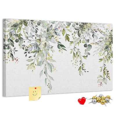Tablero de anuncios con diseño de hojas verdes y flores delicadas al fondo