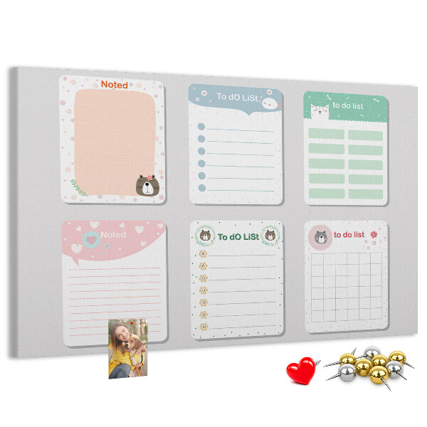 Pizarra de corcho con diseño de cuadernos coloridos con motivos de animales
