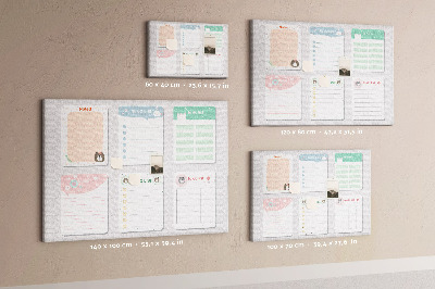 Pizarra de corcho con diseño de cuadernos coloridos con motivos de animales