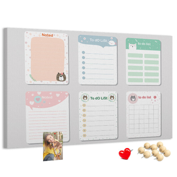 Pizarra de corcho con diseño de cuadernos coloridos con motivos de animales