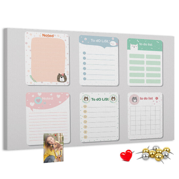 Pizarra de corcho con diseño de cuadernos coloridos con motivos de animales