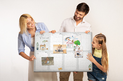 Pizarra de corcho con diseño de agenda semanal y detalles de plantas