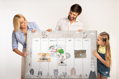 Tablero de corcho decorado con diseño de animales del bosque para agenda semanal