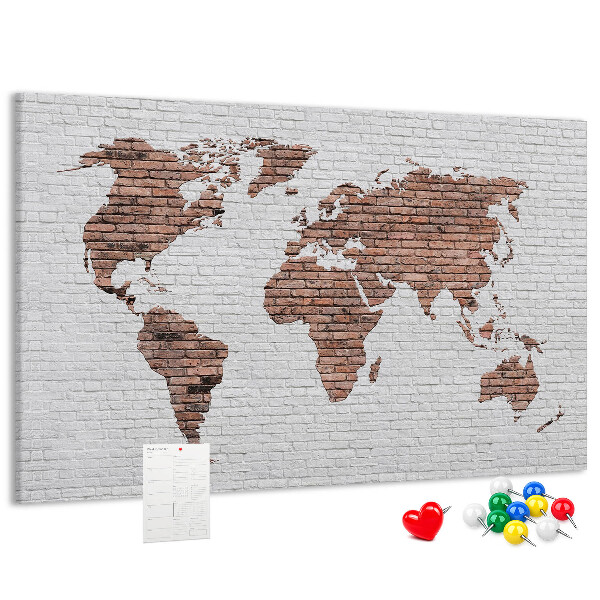 Tablero de corcho decorativo diseño de mapa del mundo sobre fondo de pared de ladrillos