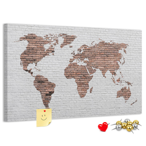 Tablero de corcho decorativo diseño de mapa del mundo sobre fondo de pared de ladrillos