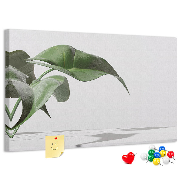 Tablero de corcho decorativo hojas delicadas sobre fondo minimalista