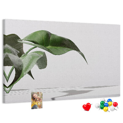 Tablero de corcho decorativo hojas delicadas sobre fondo minimalista